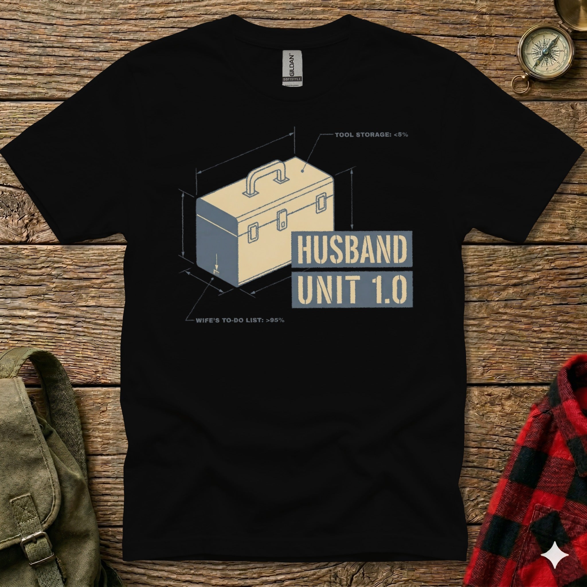 Black t-shirt with "Husband Unit 1.0" graphic showing tool storage and wife's to-do list.
