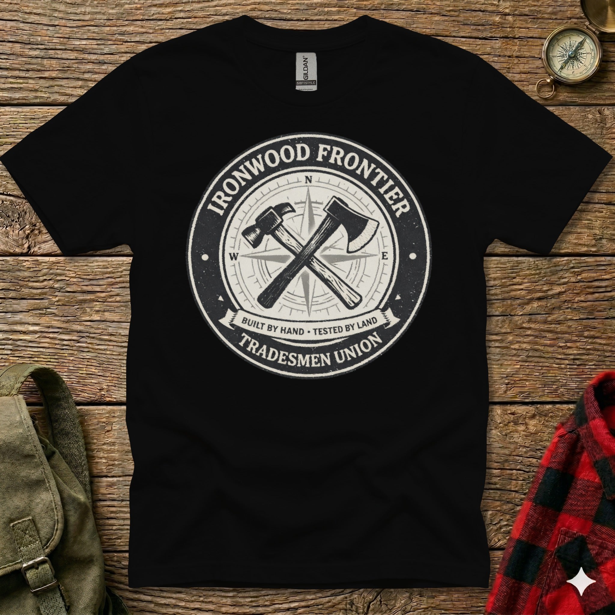 Black t-shirt with "Ironwood Frontier Tradesmen Union" circular logo.