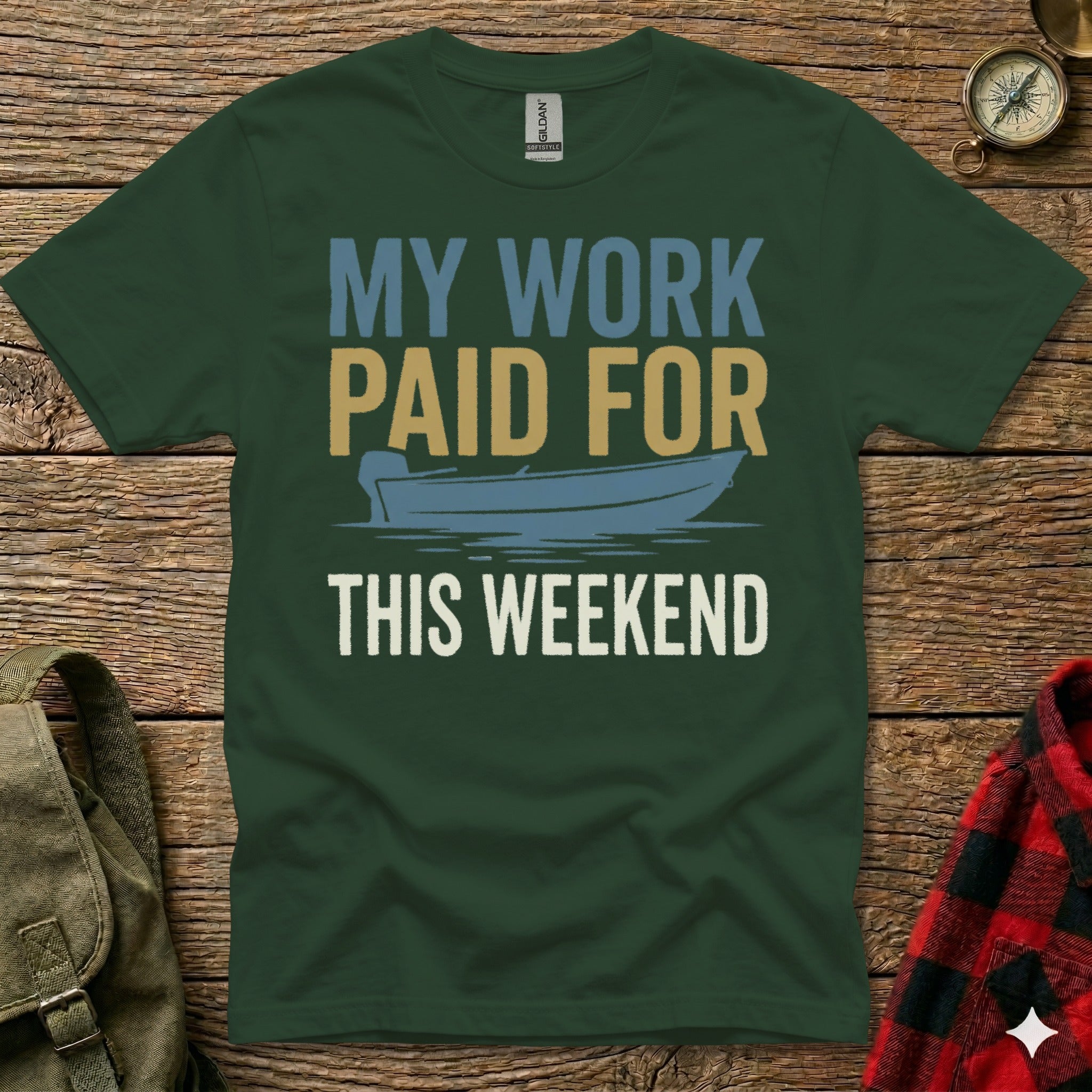 Green t-shirt with text "MY WORK PAID FOR THIS WEEKEND" and a boat graphic.