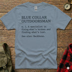 Blue Collar Outdoorsman definition t-shirt on a wooden background.