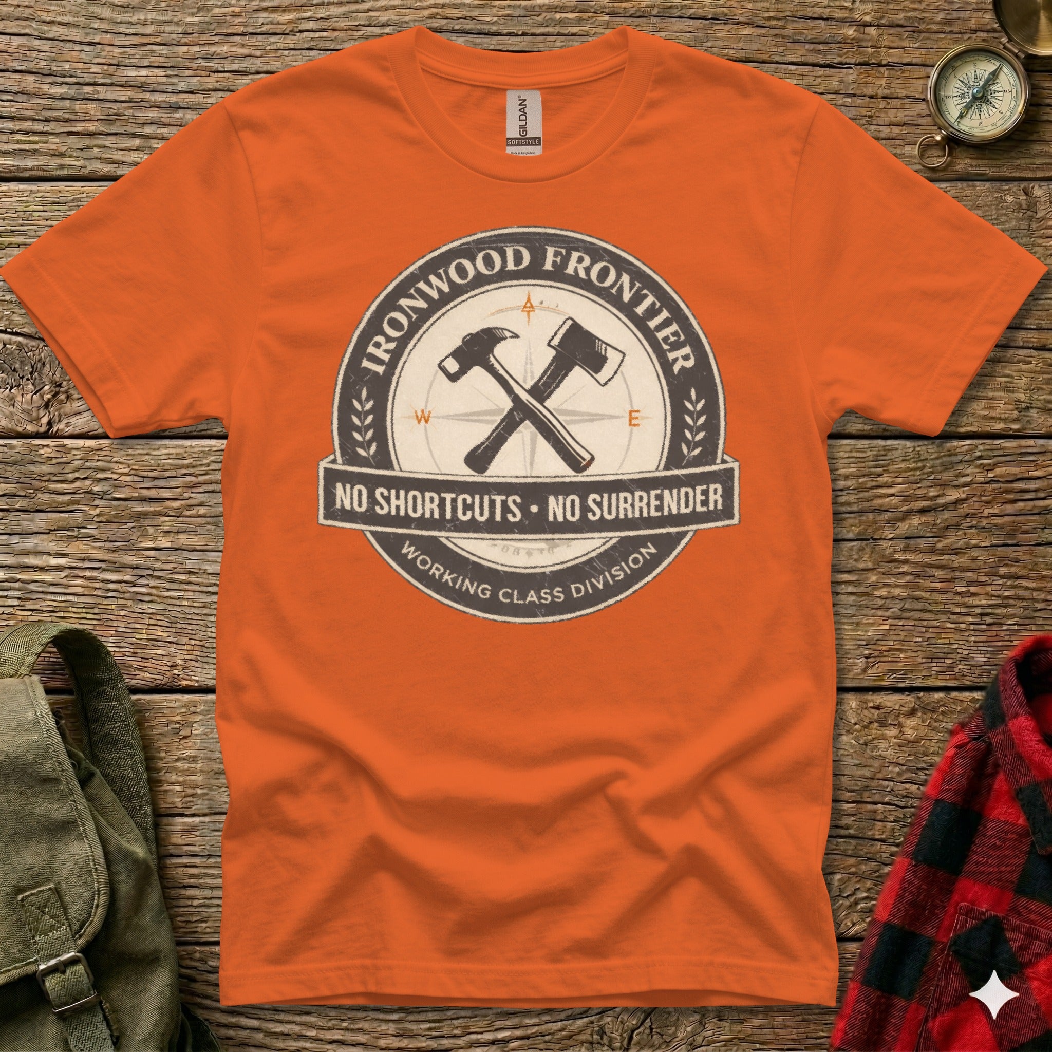 Orange t-shirt with "Ironwood Frontier Working Class Division" logo.