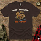 Brown t-shirt with beaver fishing graphic and text "I'm just the financing off duty for this trip".