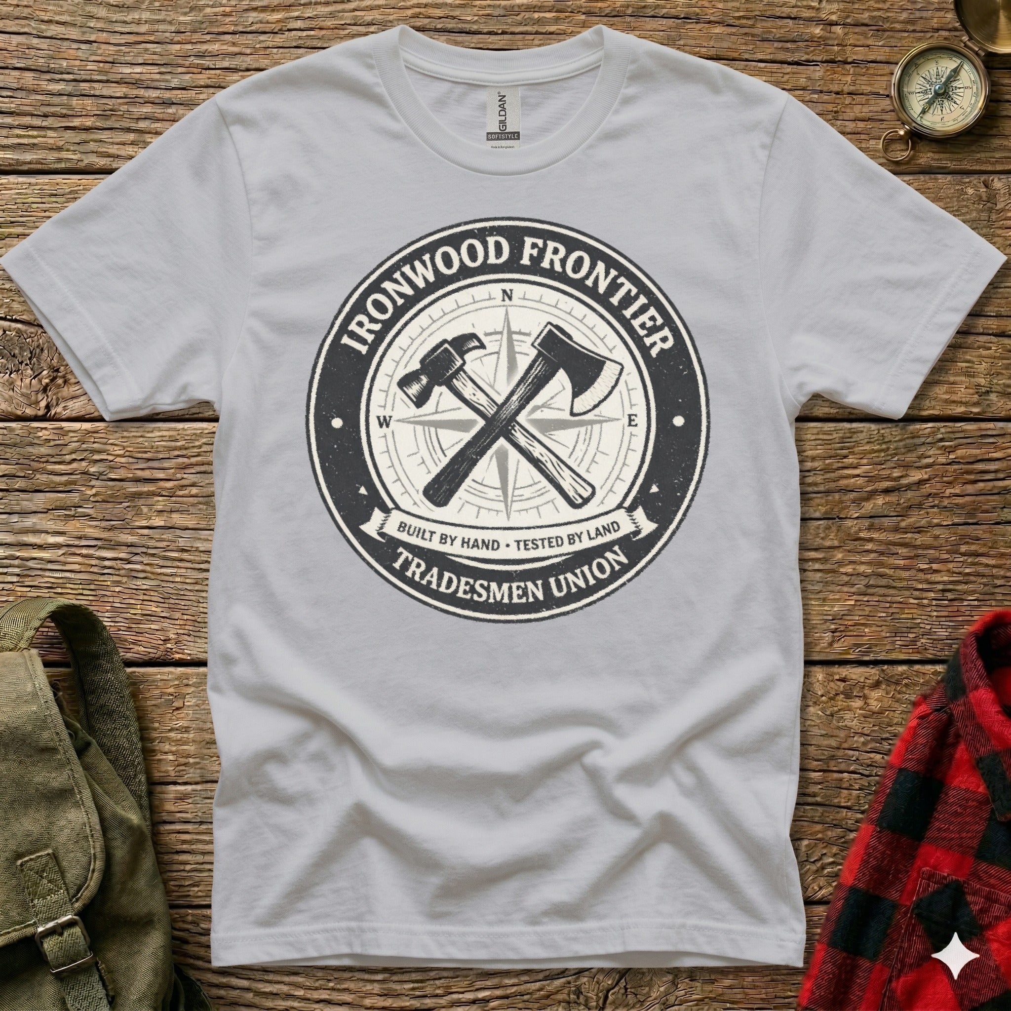 Gray t-shirt with "Ironwood Frontier Tradesmen Union" circular logo.