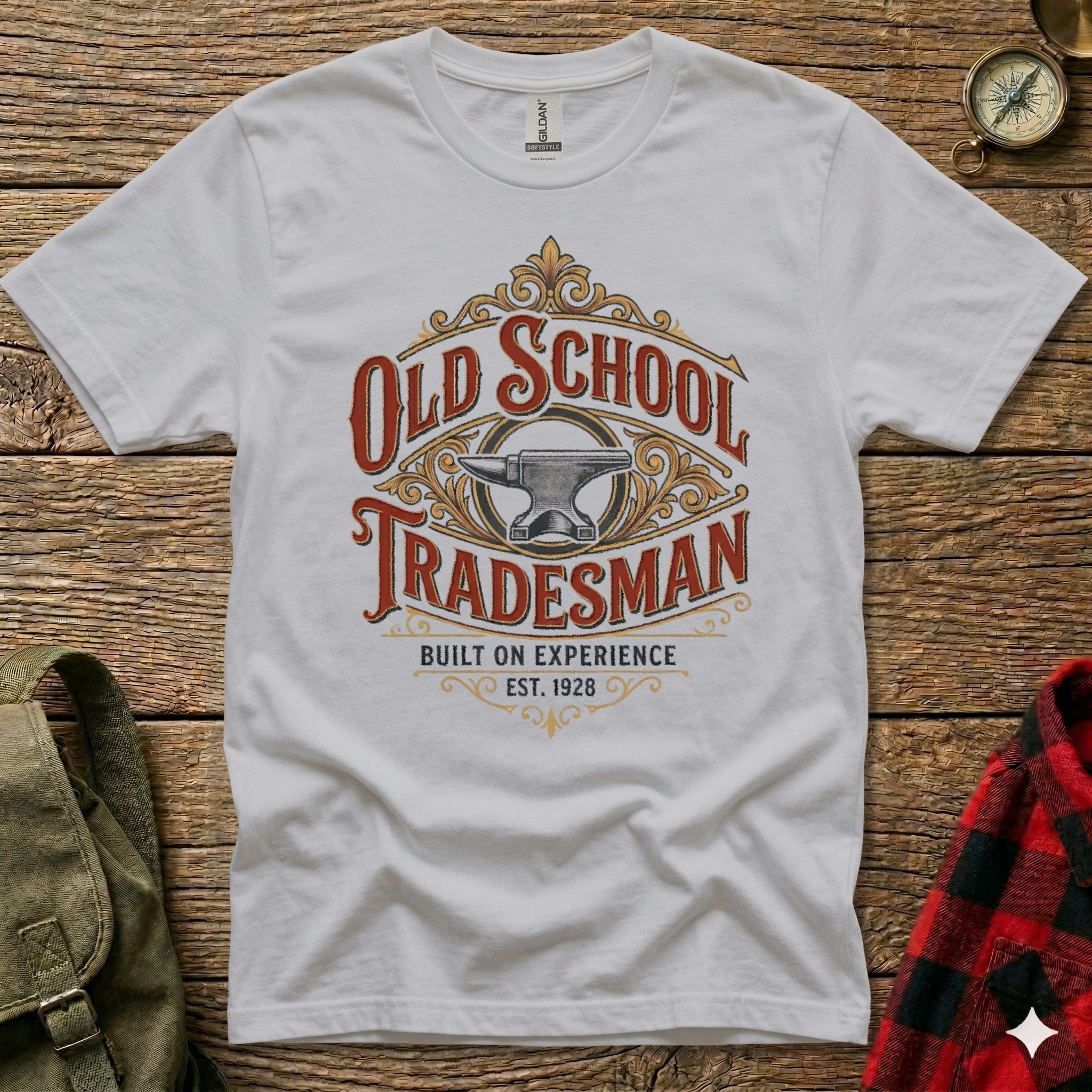 White t-shirt with "Old School Tradesman" and anvil graphic, EST. 1928.