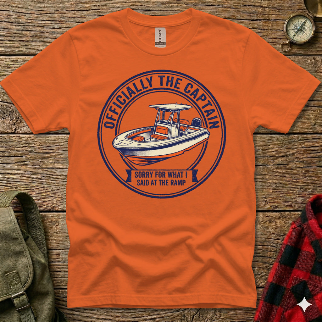 Orange t-shirt with circular graphic "Officially the Captain" and boat.