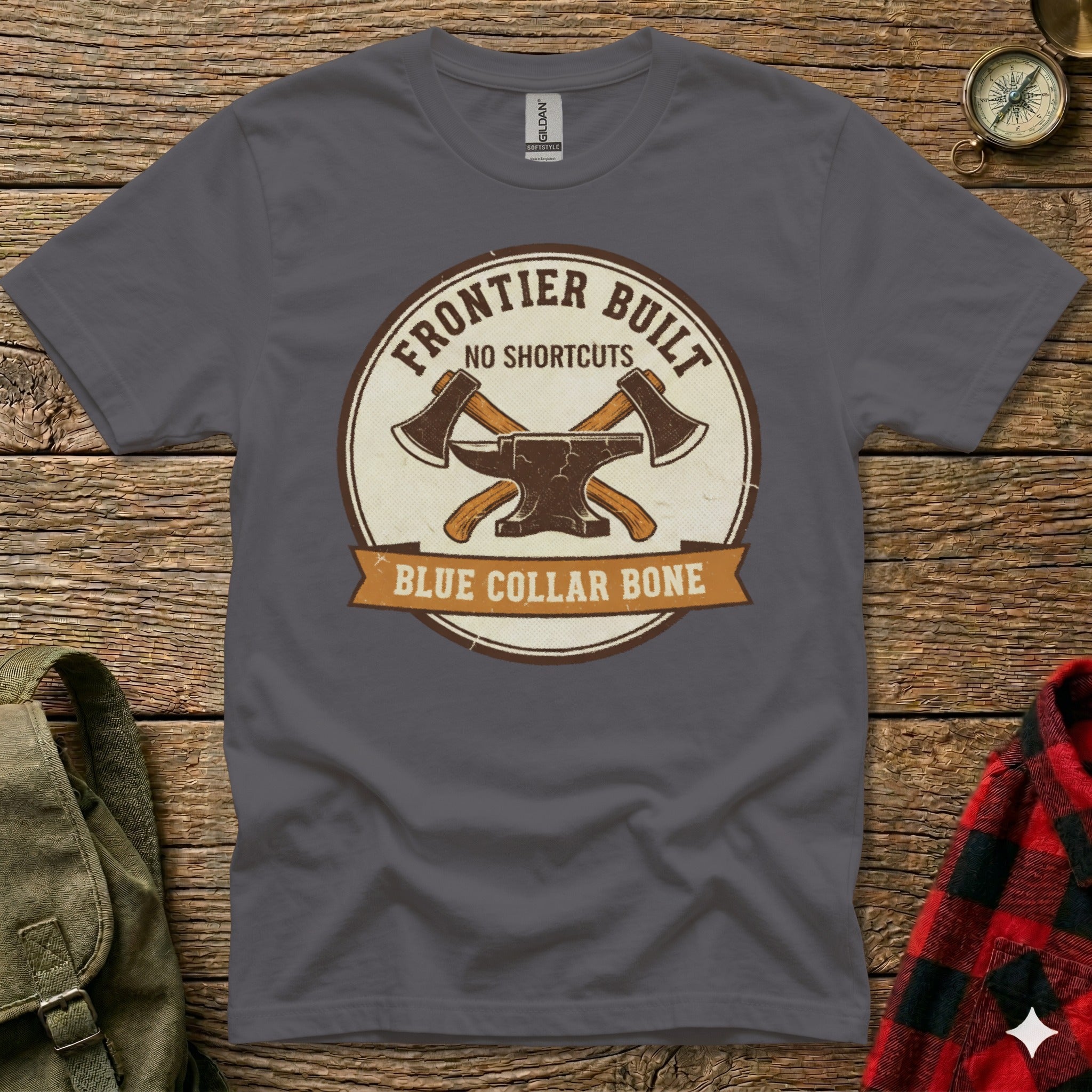 Dark grey t-shirt with vintage "Frontier Built" logo featuring crossed axes and anvil.