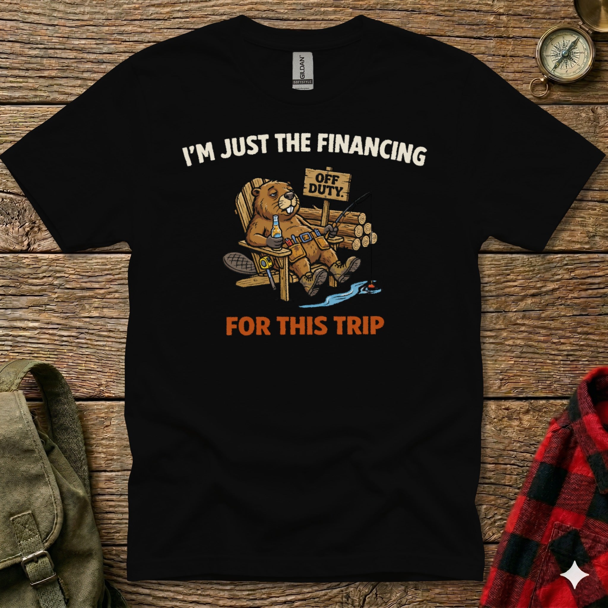 Beaver sitting in a chair, fishing, with text "I'M JUST THE FINANCING OFF DUTY FOR THIS TRIP".