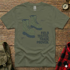 Olive green t-shirt with graphic of infantry boots, steel toe modification, and text.