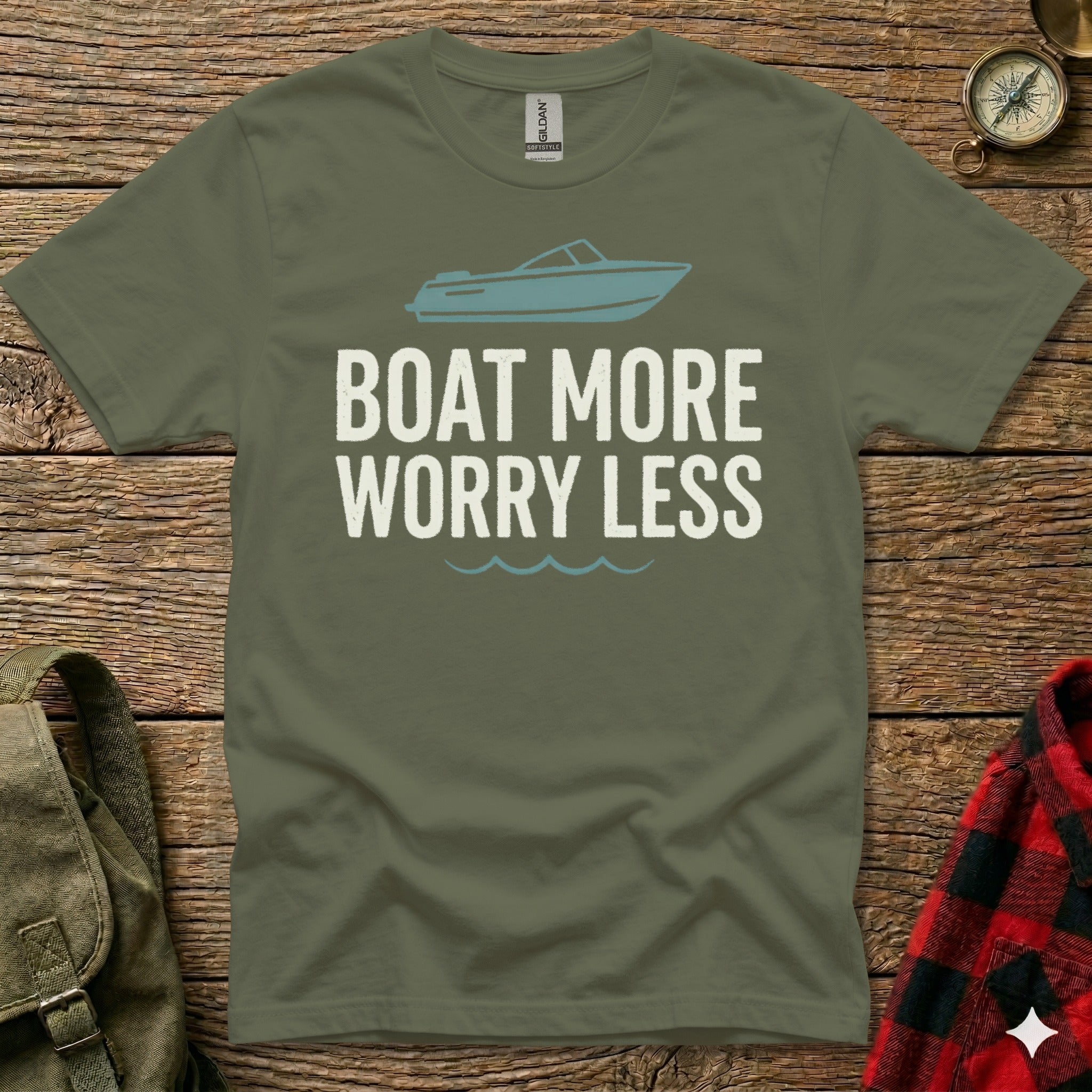 Olive green t-shirt with "BOAT MORE WORRY LESS" text and boat graphic.