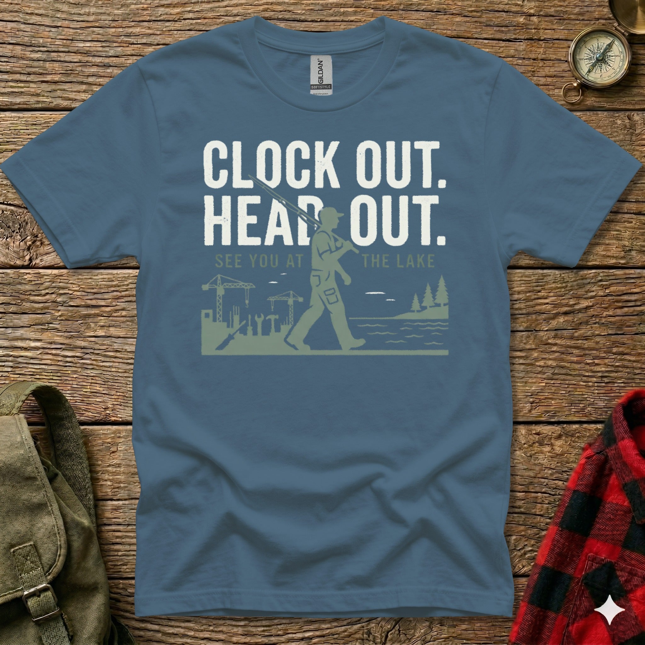 Blue t-shirt with "Clock Out. Head Out. See You At The Lake" text and graphic.