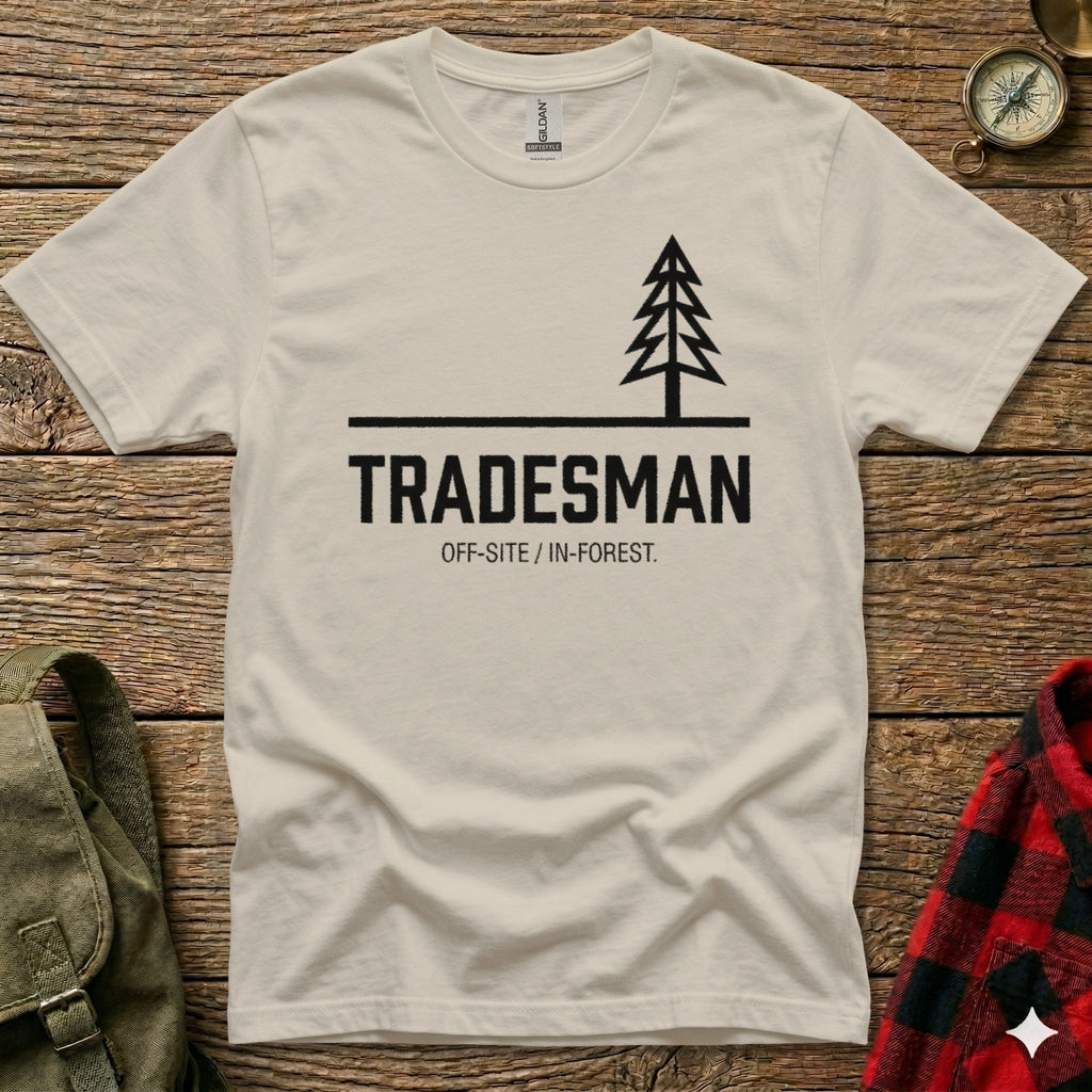 Cream t-shirt with black text and a simple tree graphic.