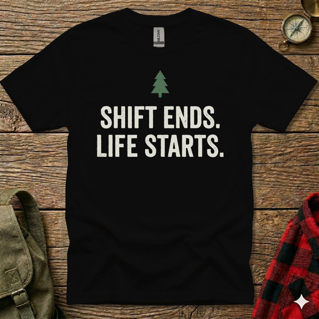 Black t-shirt with white text "SHIFT ENDS. LIFE STARTS." and a small green tree.