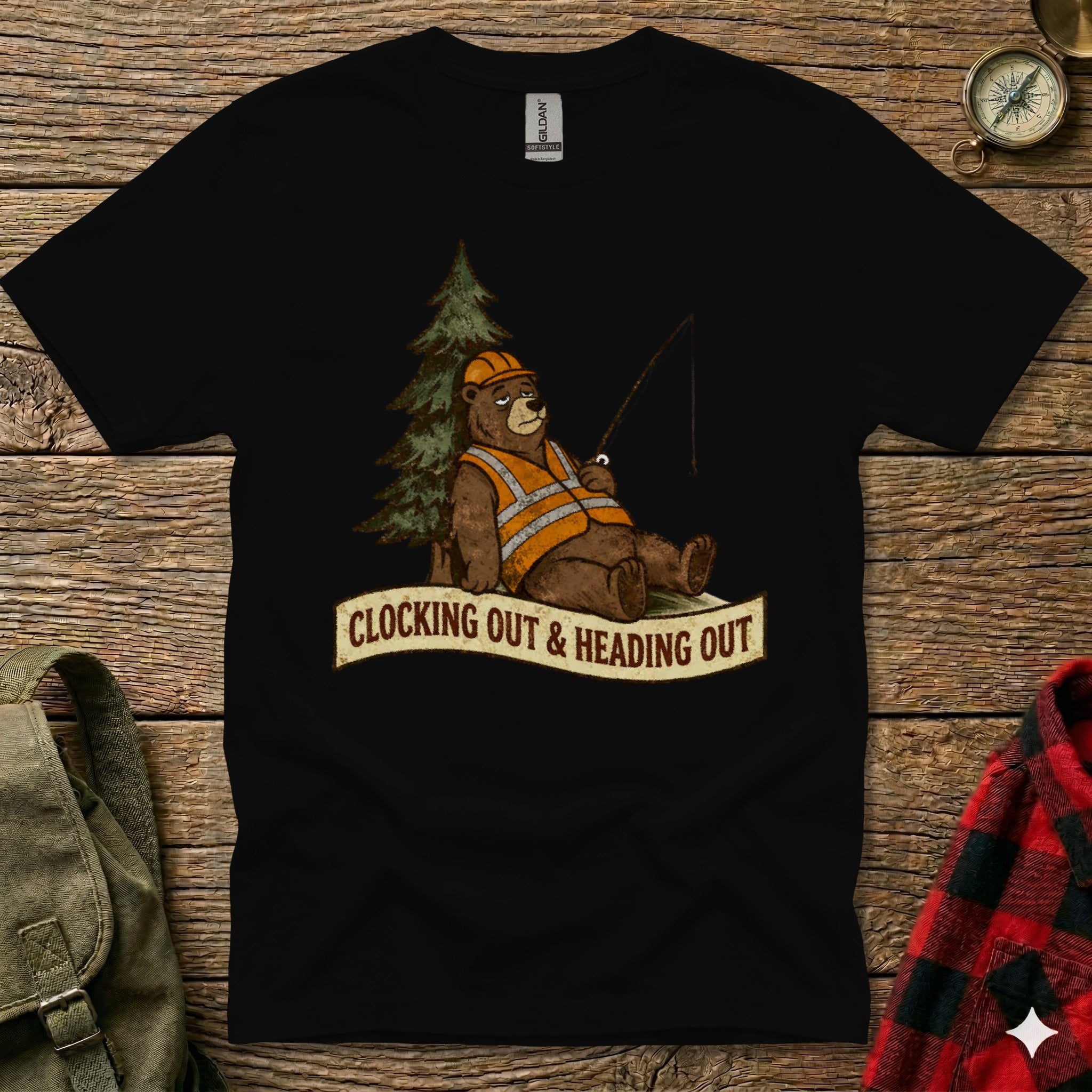 Cartoon bear in hard hat and safety vest fishing, with text "Clocking Out & Heading Out."