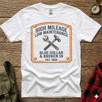 White t-shirt with "High Mileage Low Maintenance Blue Collar" graphic and tools.