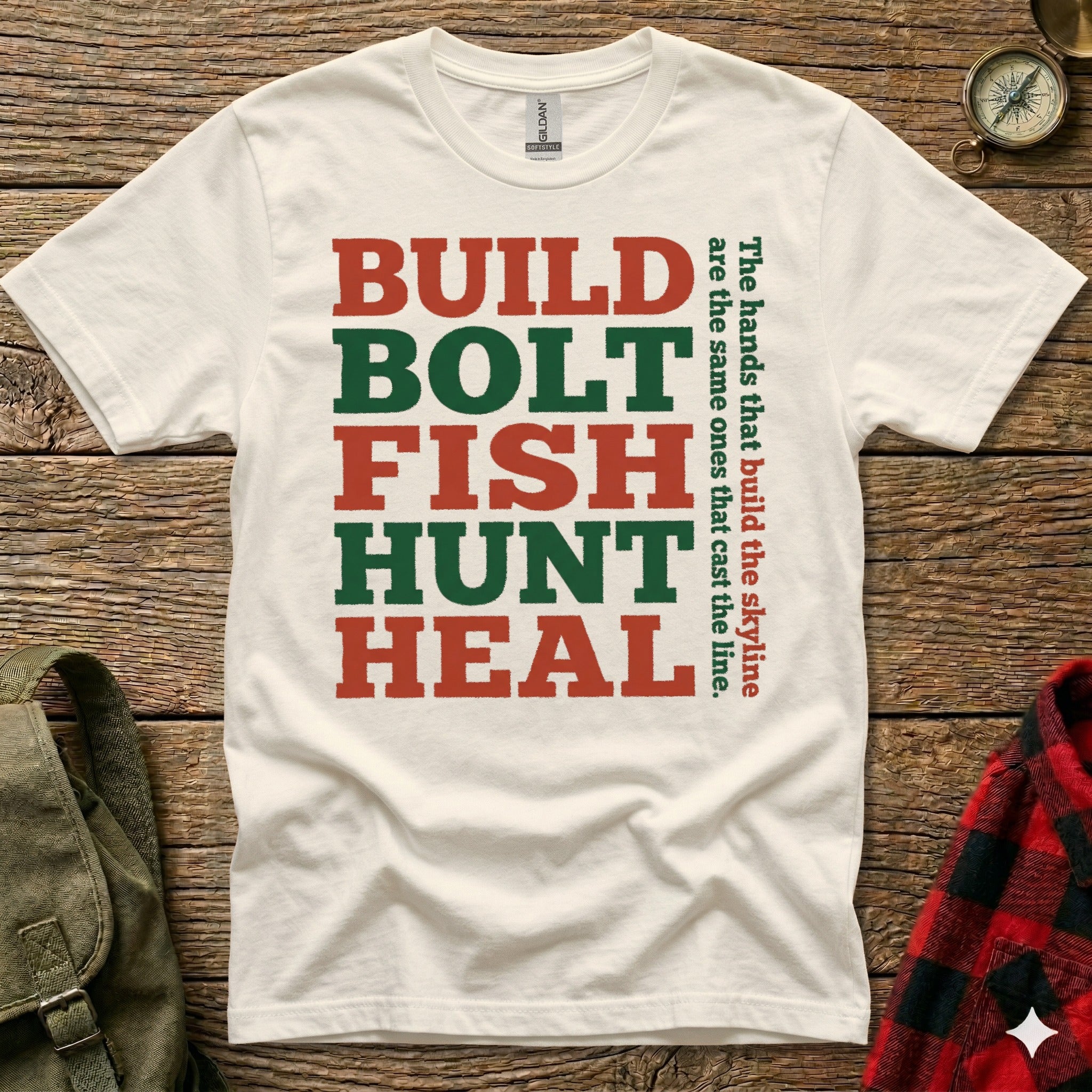 White t-shirt with "BUILD BOLT FISH HUNT HEAL" text and vertical phrase.