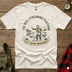 T-shirt graphic: Reel Streaming Platform logo with fisherman in river, est. before broadband.