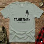 Light sage t-shirt with "TRADESMAN OFF-SITE / IN-FOREST." text and a pine tree graphic.