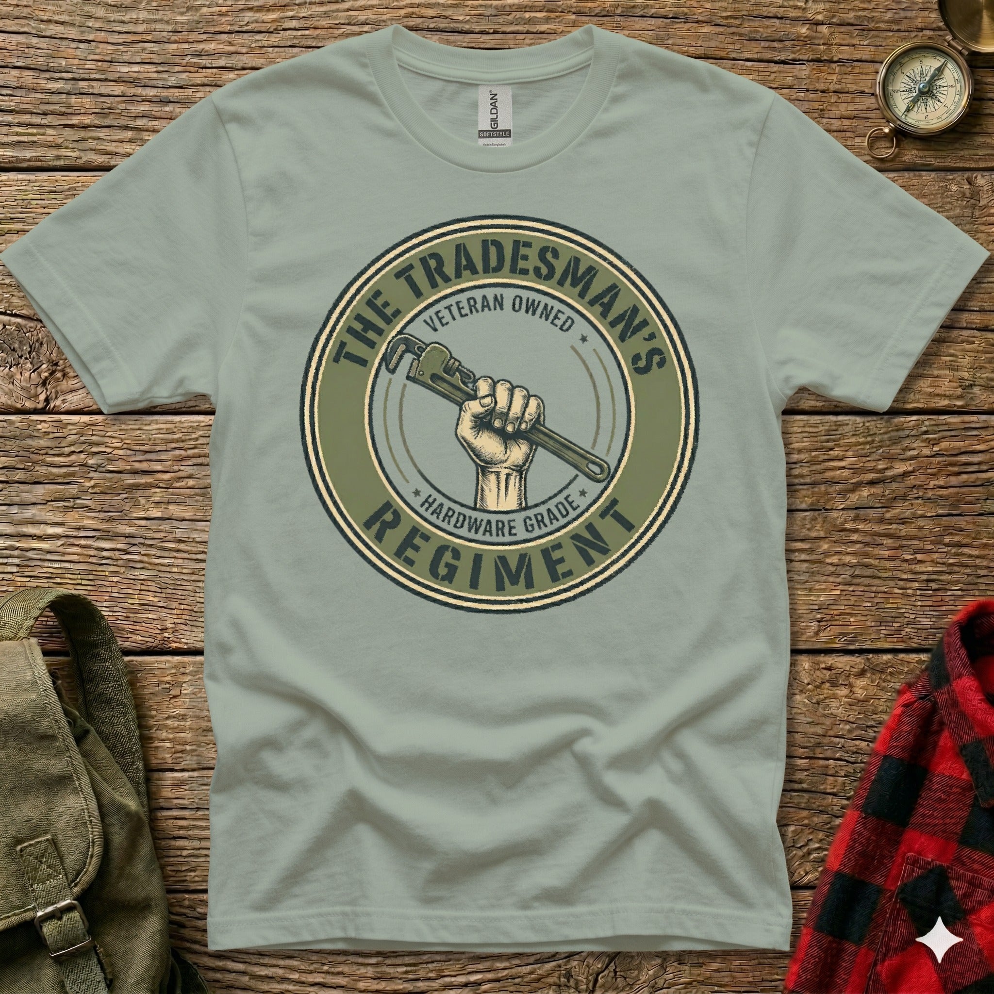 Tradesman's Hardware Regiment veteran-owned circular logo on a light green t-shirt.