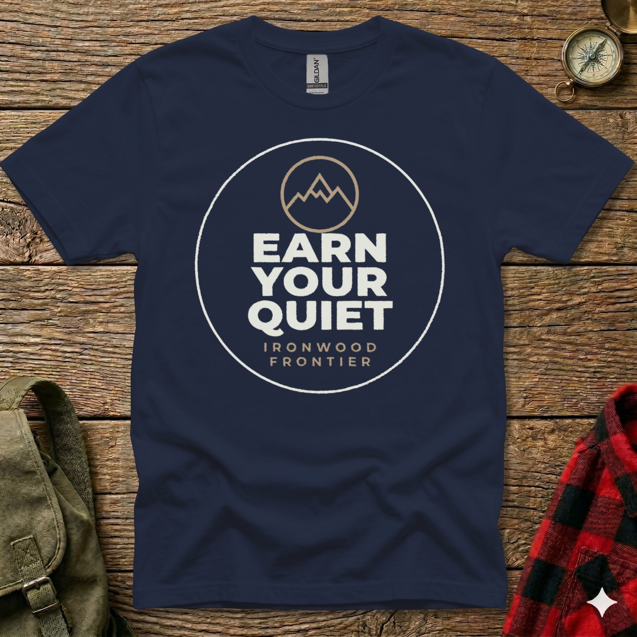 Navy t-shirt with "Earn Your Quiet Ironwood Frontier" logo.