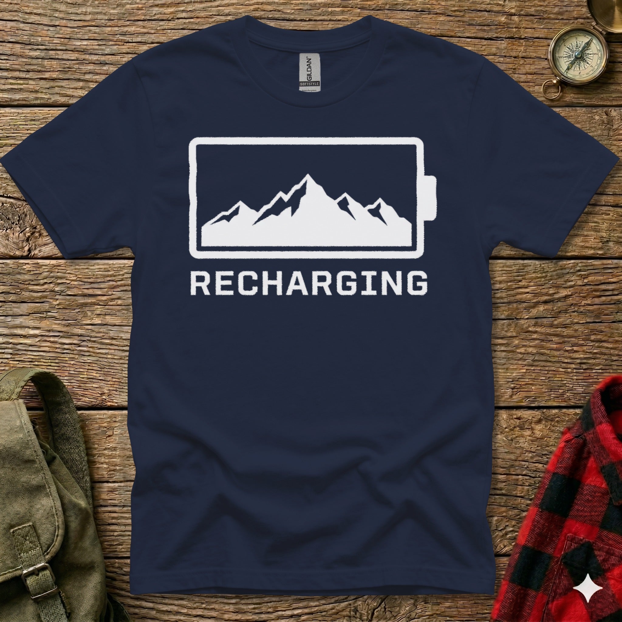 Navy t-shirt with a mountain range inside a battery icon, text "RECHARGING".
