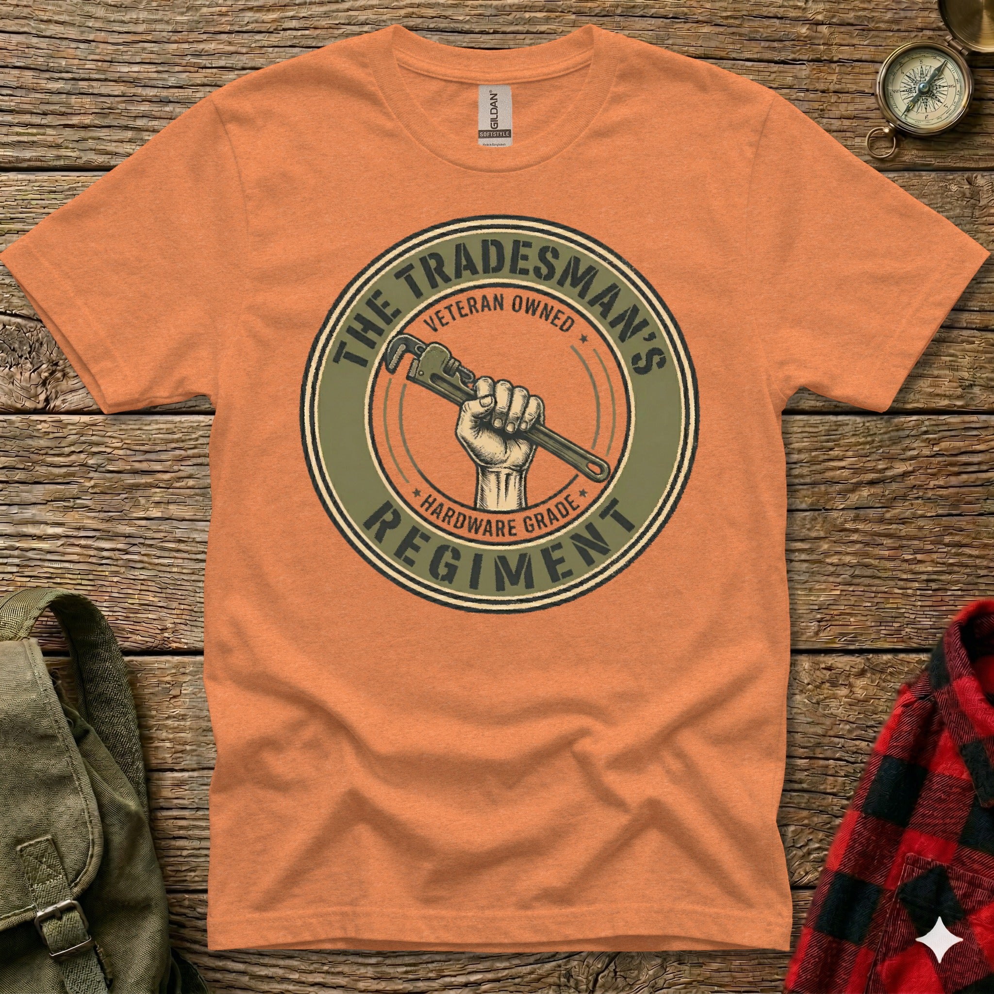 Orange t-shirt with "The Tradesman's Regiment" and wrench logo.