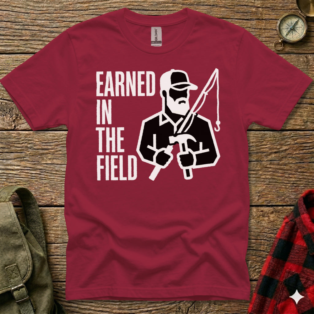Maroon t-shirt with "Earned in the Field" text and silhouette of a man fishing.