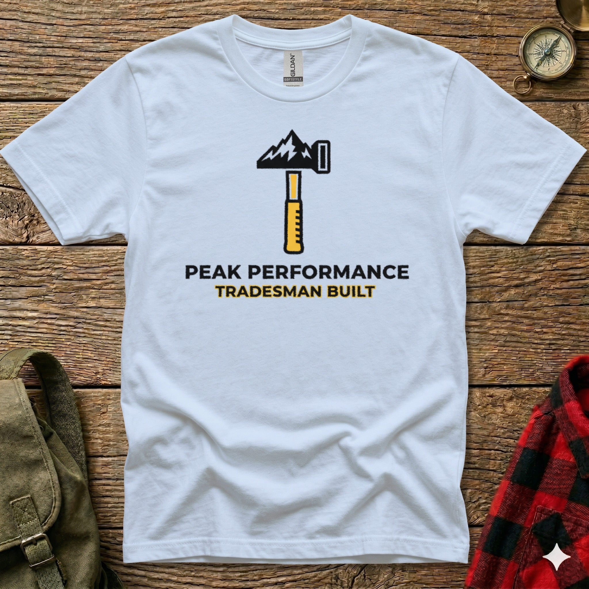 White t-shirt with black and yellow "Peak Performance Tradesman Built" logo.