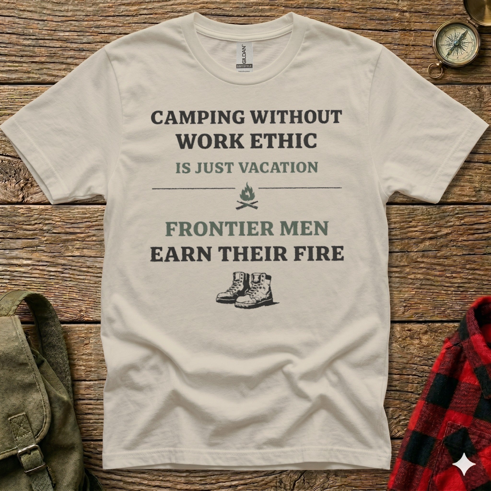 White t-shirt with "Camping Without Work Ethic Is Just Vacation" and "Frontier Men Earn Their Fire" text.