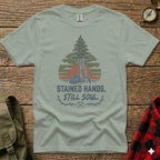 T-shirt with "Stained Hands. Still Soul." text and construction graphics.