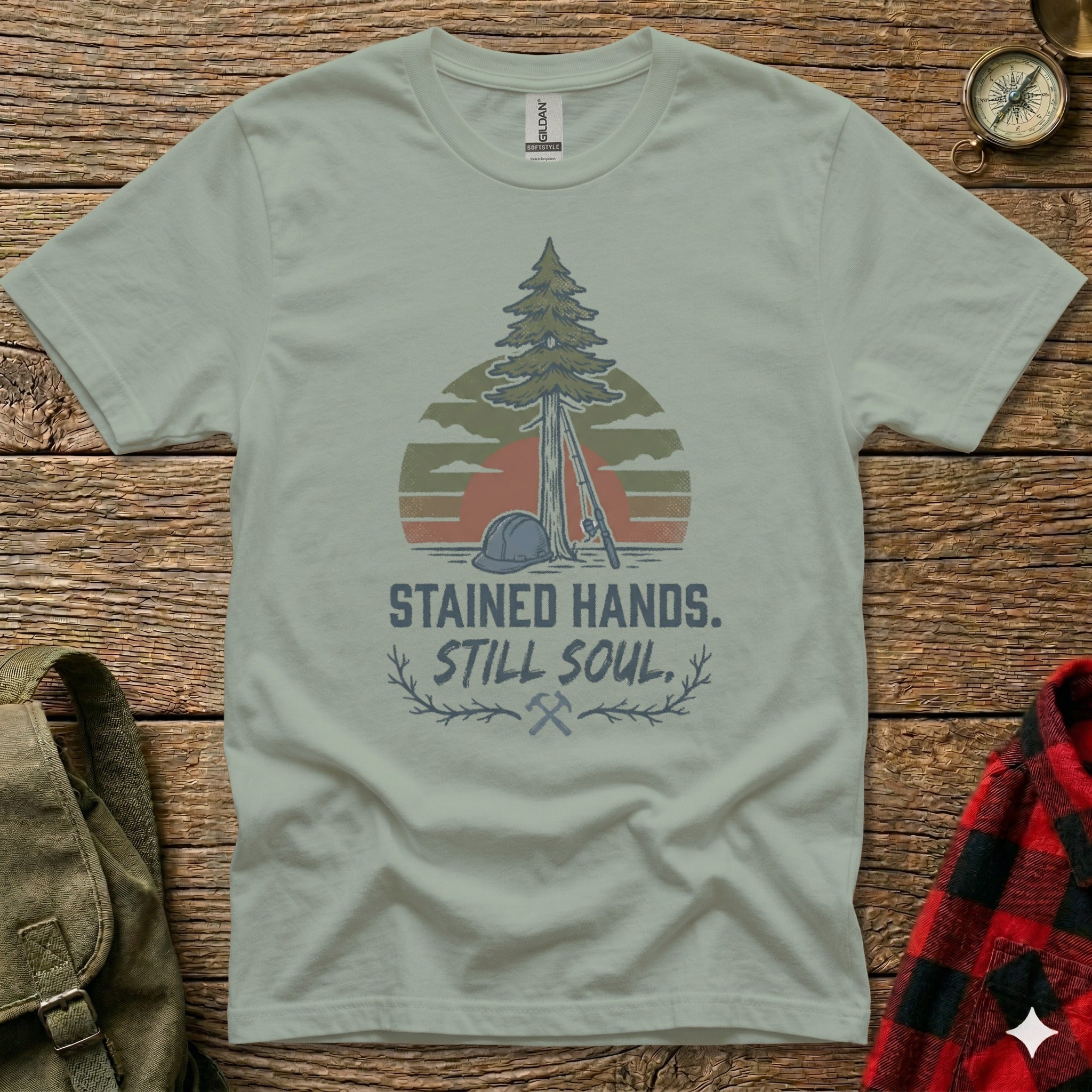 T-shirt with "Stained Hands. Still Soul." text and construction graphics.