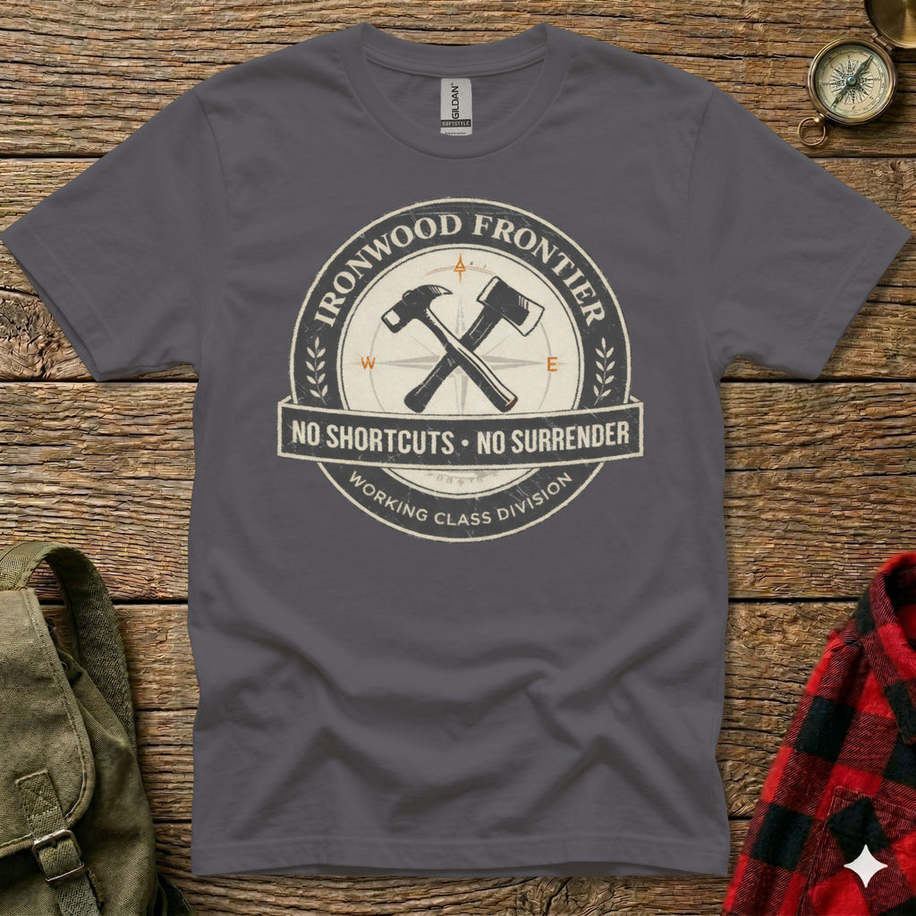 Dark grey t-shirt with Ironwood Frontier logo, hammers, compass, and text.