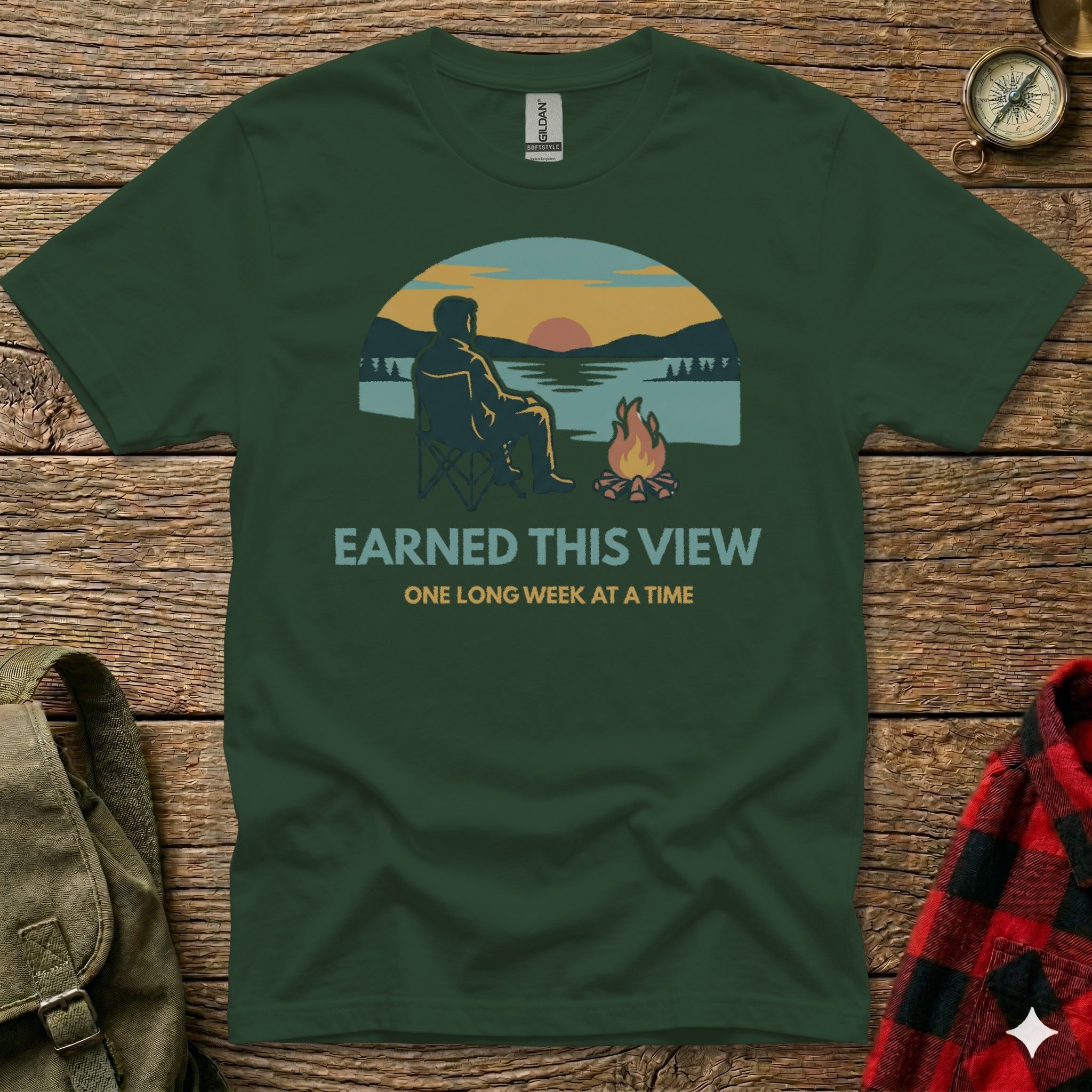 Green t-shirt with "Earned This View" and campfire graphic.