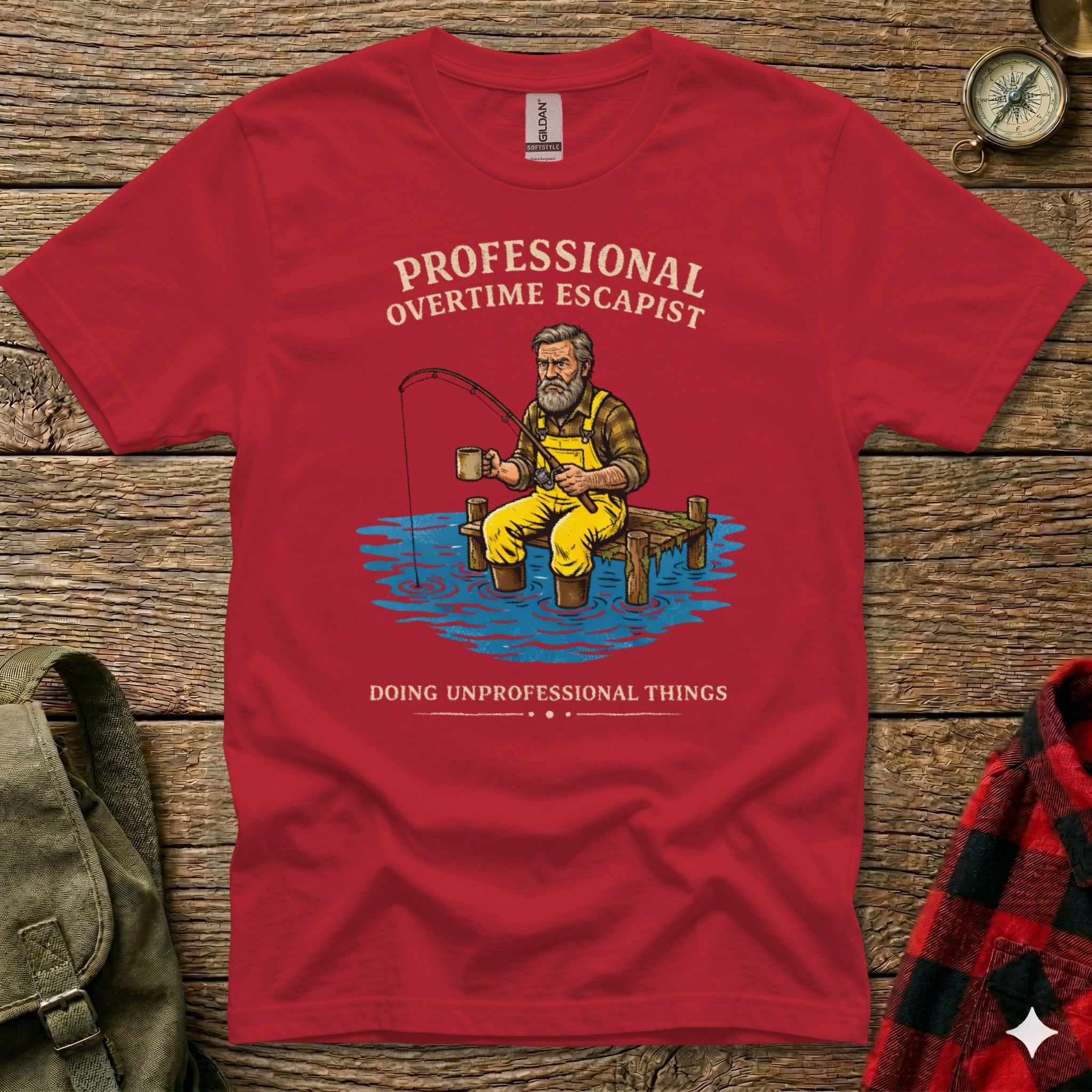 Red t-shirt graphic: man fishing on dock, "Professional Overtime Escapist" text.