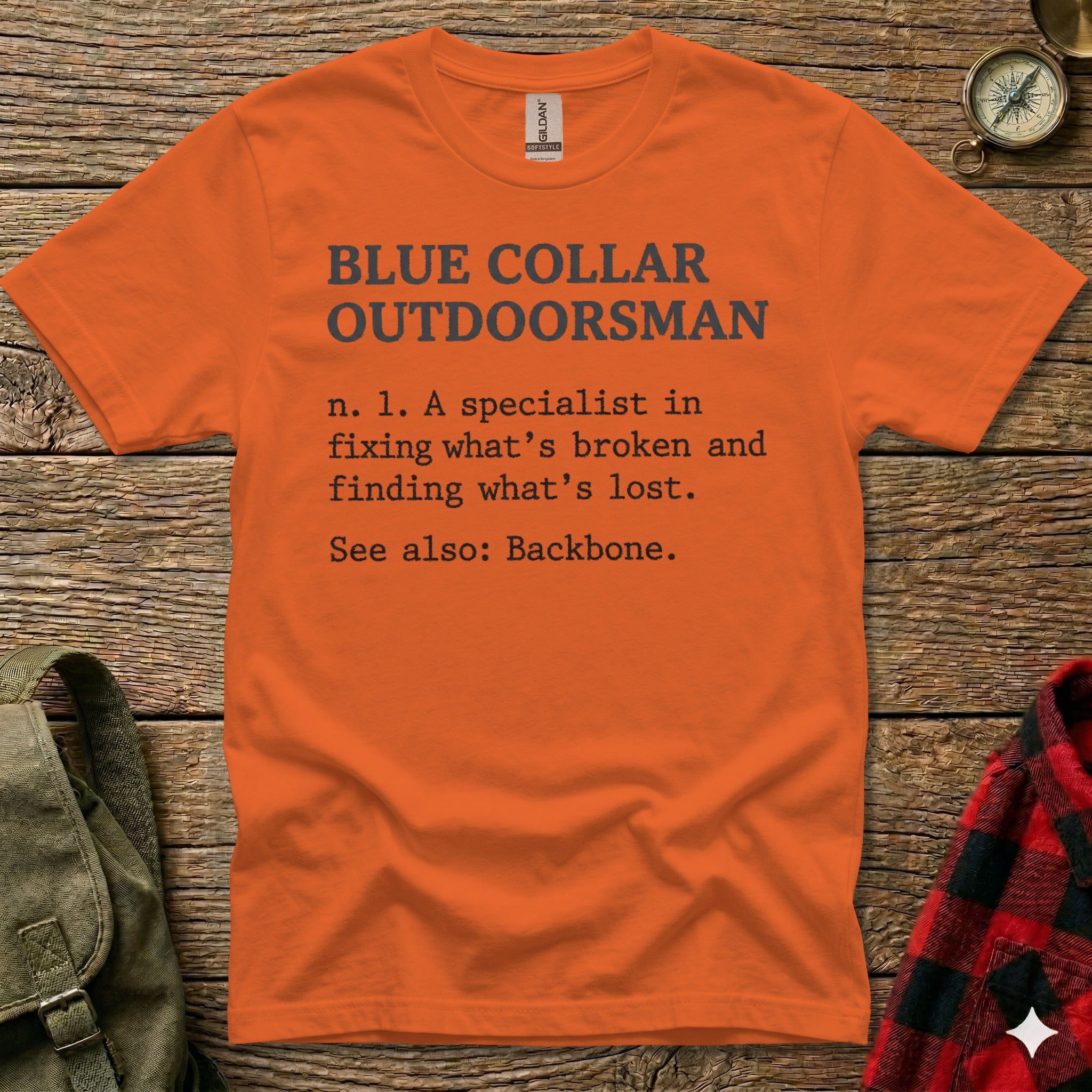 Orange t-shirt with "Blue Collar Outdoorsman" definition and "Backbone" reference.