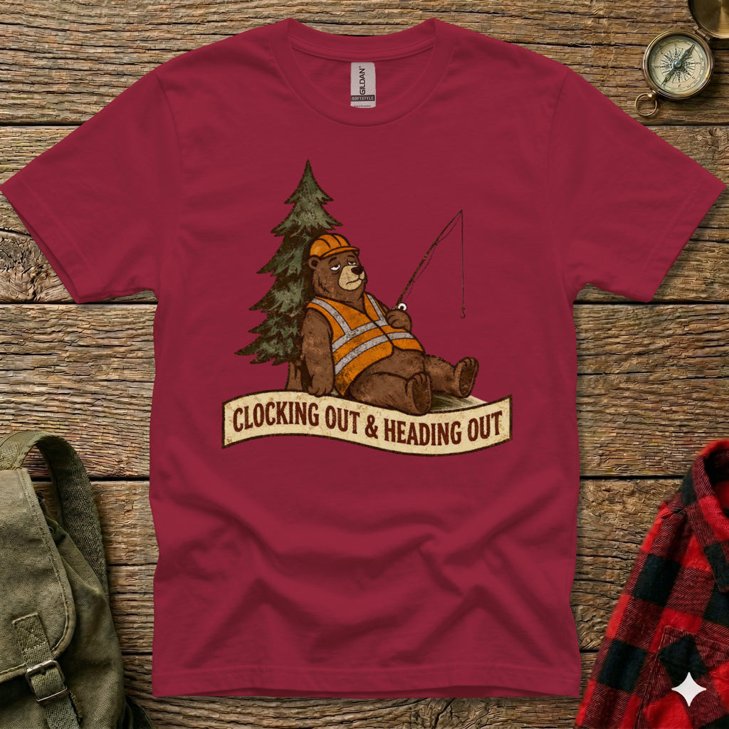 T-shirt graphic of a bear in a hard hat and safety vest fishing next to a tree.