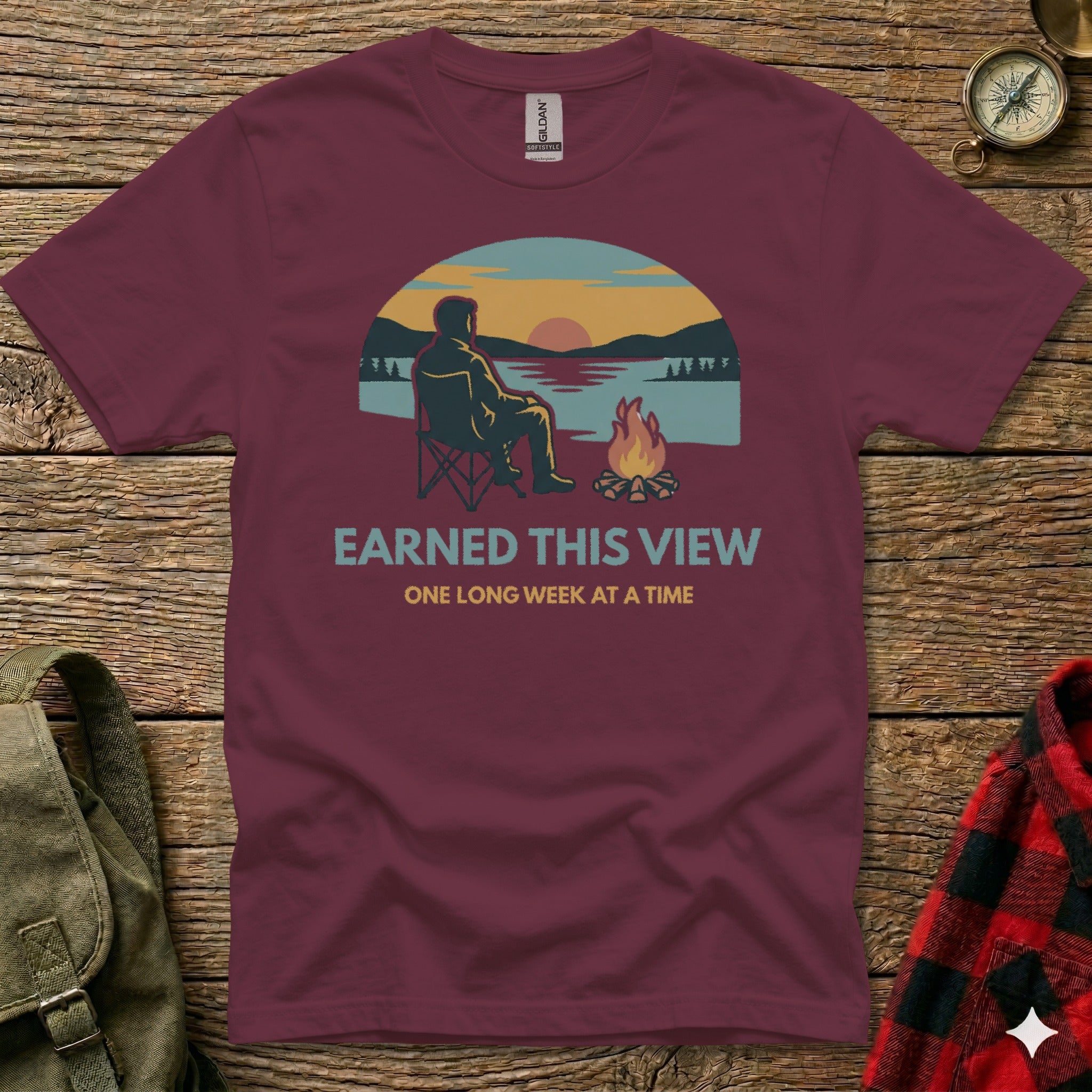 Maroon t-shirt with "Earned This View" and campfire graphic.