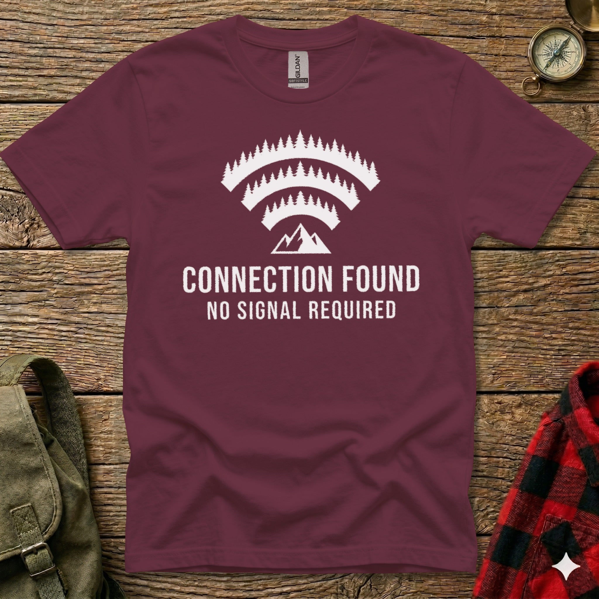 Maroon t-shirt with "CONNECTION FOUND NO SIGNAL REQUIRED" and mountain logo.