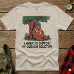 Bear in hard hat drinking coffee under tree, "I work to support my outdoor addiction" text.