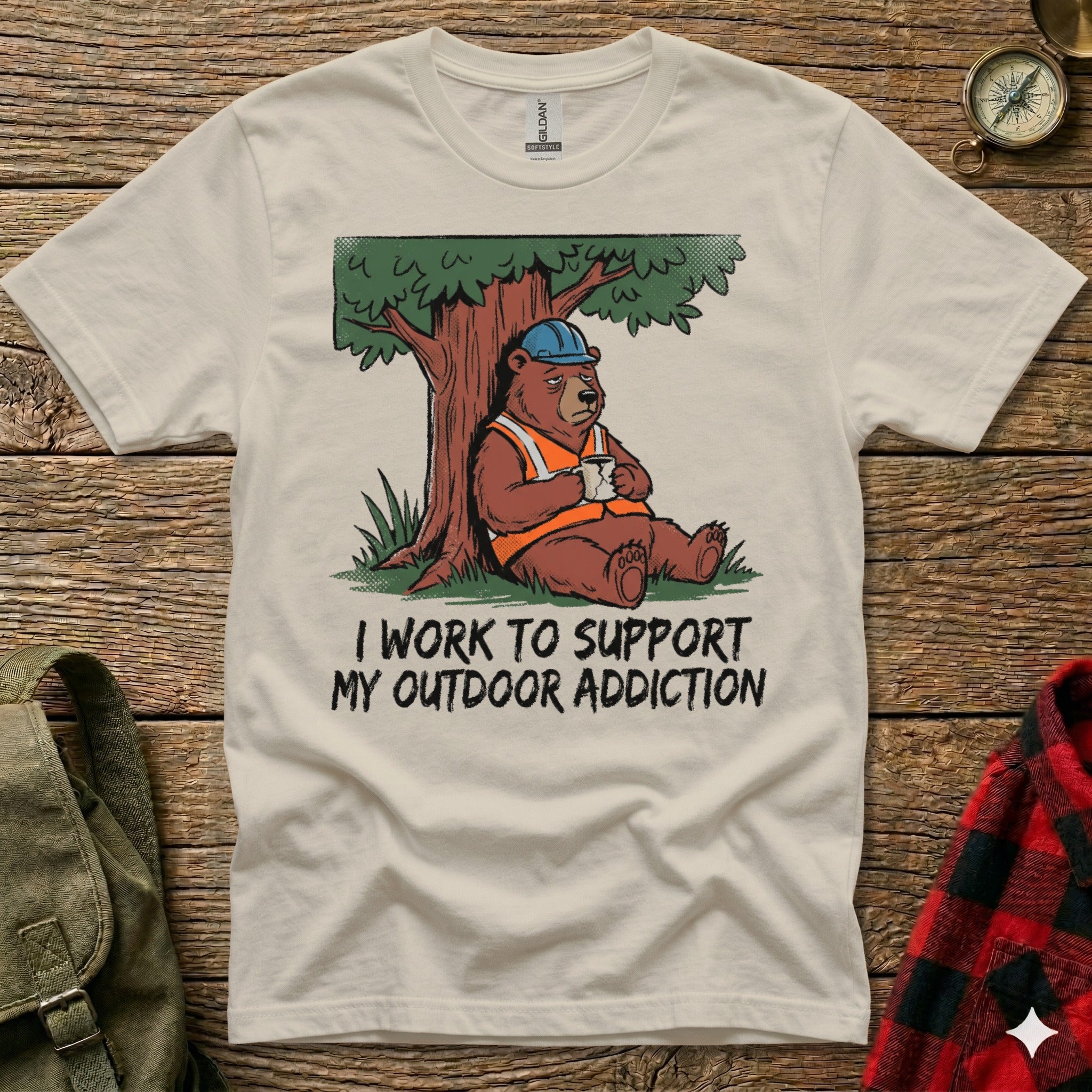 Bear in hard hat drinking coffee under tree, "I work to support my outdoor addiction" text.