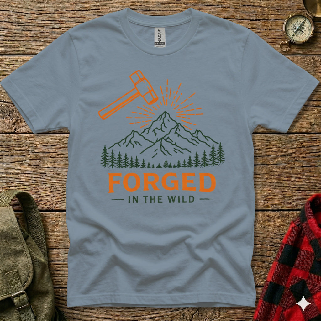 Gray t-shirt with "Forged in the Wild" text and mountain graphic.