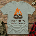 T-shirt with graphic of hammer and wrench crossed over campfire.