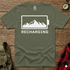Olive green t-shirt with "RECHARGING" text and a mountain landscape inside a battery icon.