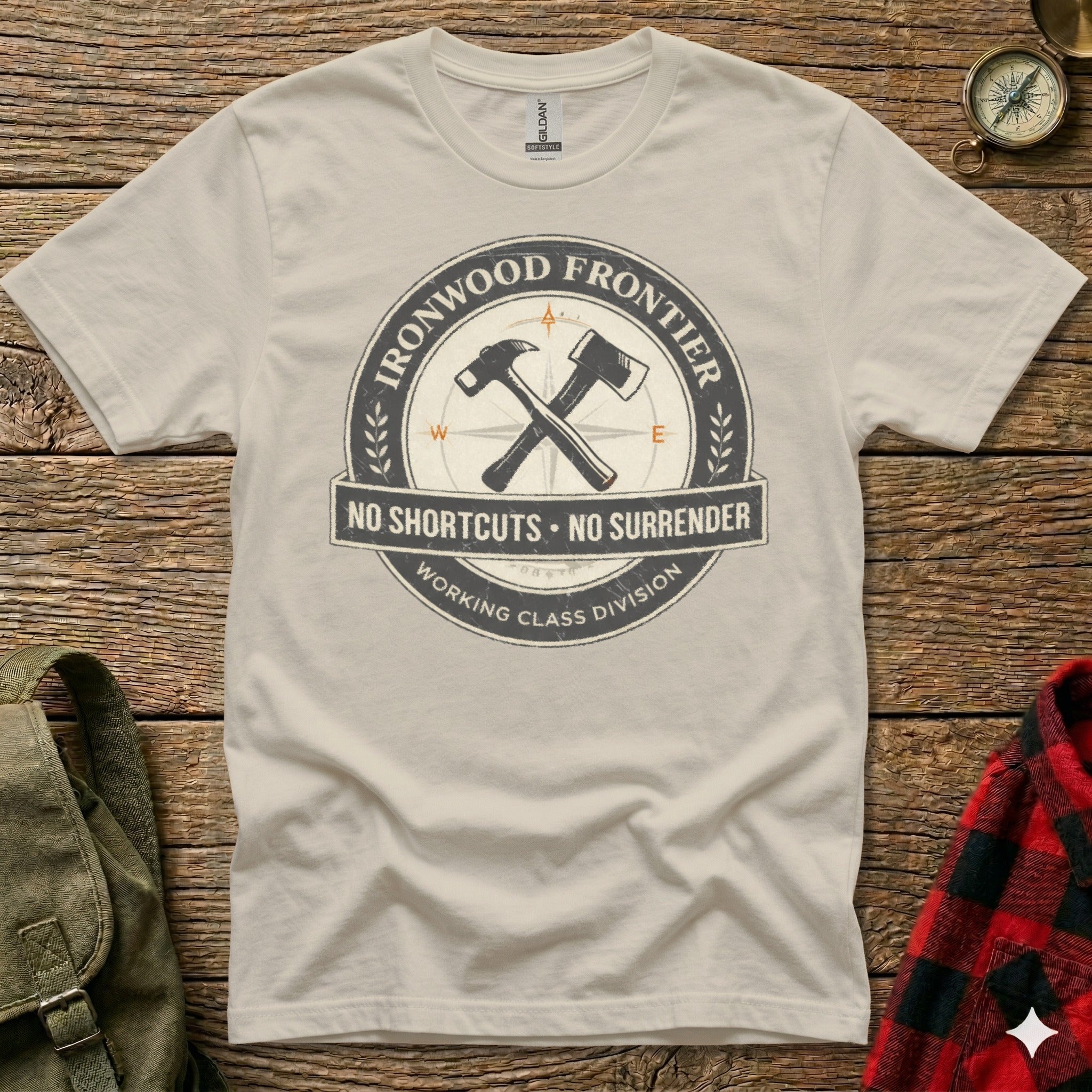 Cream t-shirt with circular Ironwood Frontier logo: "No Shortcuts. No Surrender."