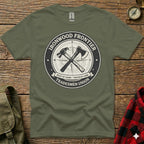 Green t-shirt with circular Ironwood Frontier Tradesmen Union logo.
