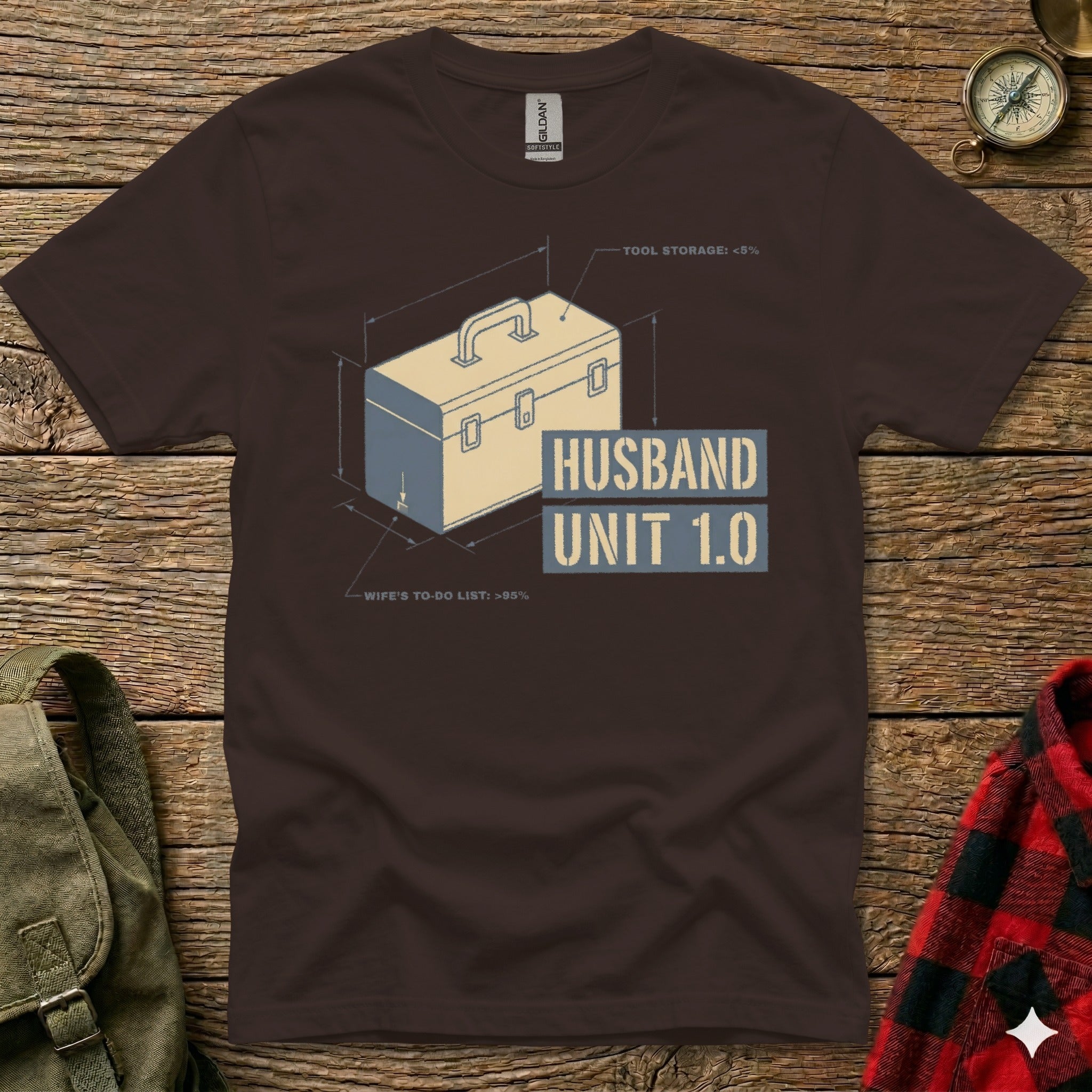 Brown t-shirt with "HUSBAND UNIT 1.0" and tool storage/to-do list percentages.