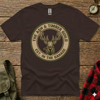 Brown t-shirt featuring the Ash & Timber Guild logo with a deer smoking a cigar.