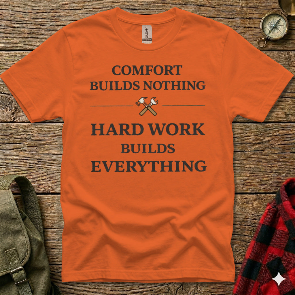 Orange t-shirt with "COMFORT BUILDS NOTHING HARD WORK BUILDS EVERYTHING" text.