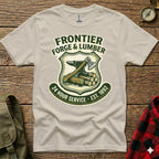 T-shirt with Frontier Forge & Lumber logo: axe, anvil, and wood.