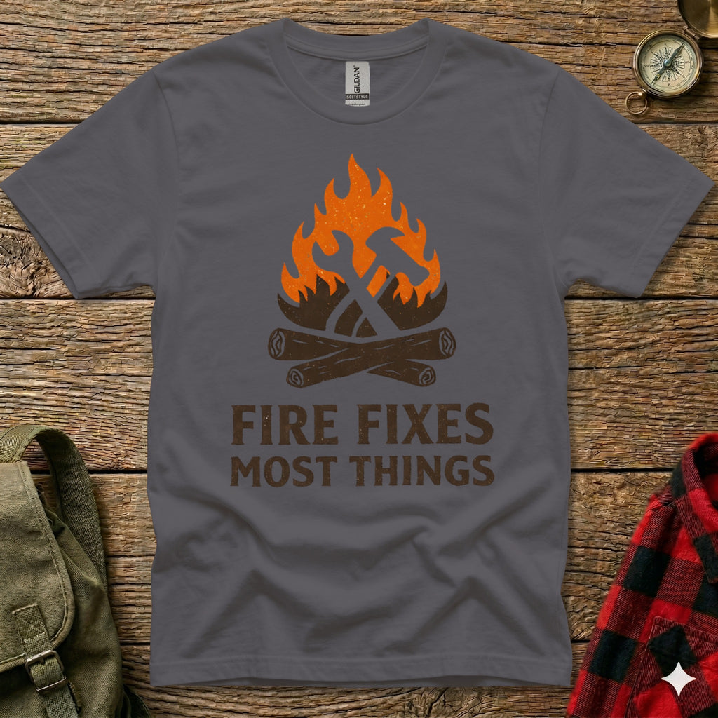 Grey t-shirt with "FIRE FIXES MOST THINGS" text and crossed hammer and axe over flames.