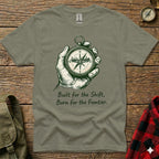 T-shirt with hand holding compass and text "Built for the Shift, Born for the Frontier."